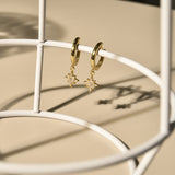 Gold Star Drop Huggie Earrings