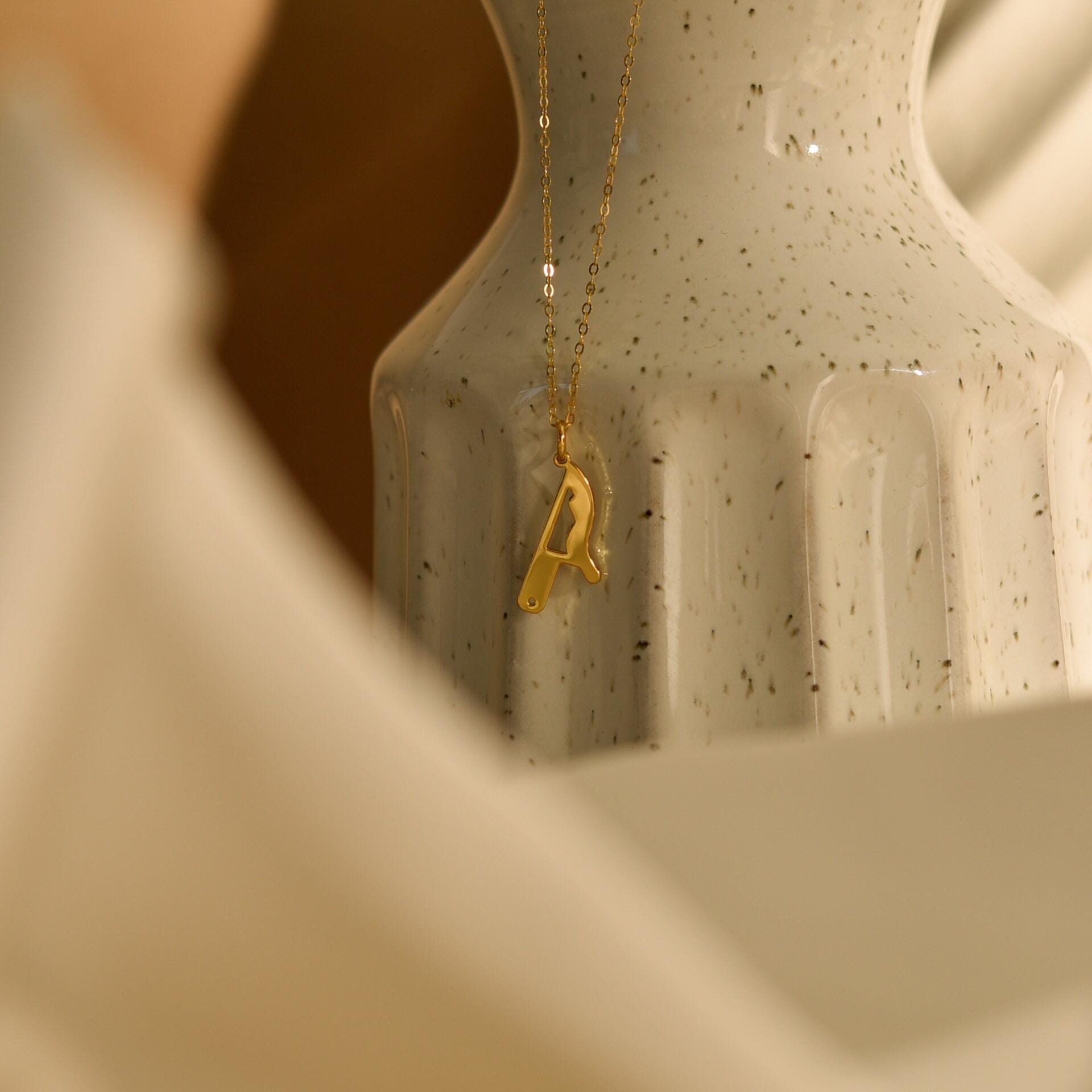 Gold Dripping Knife Pendant Necklace