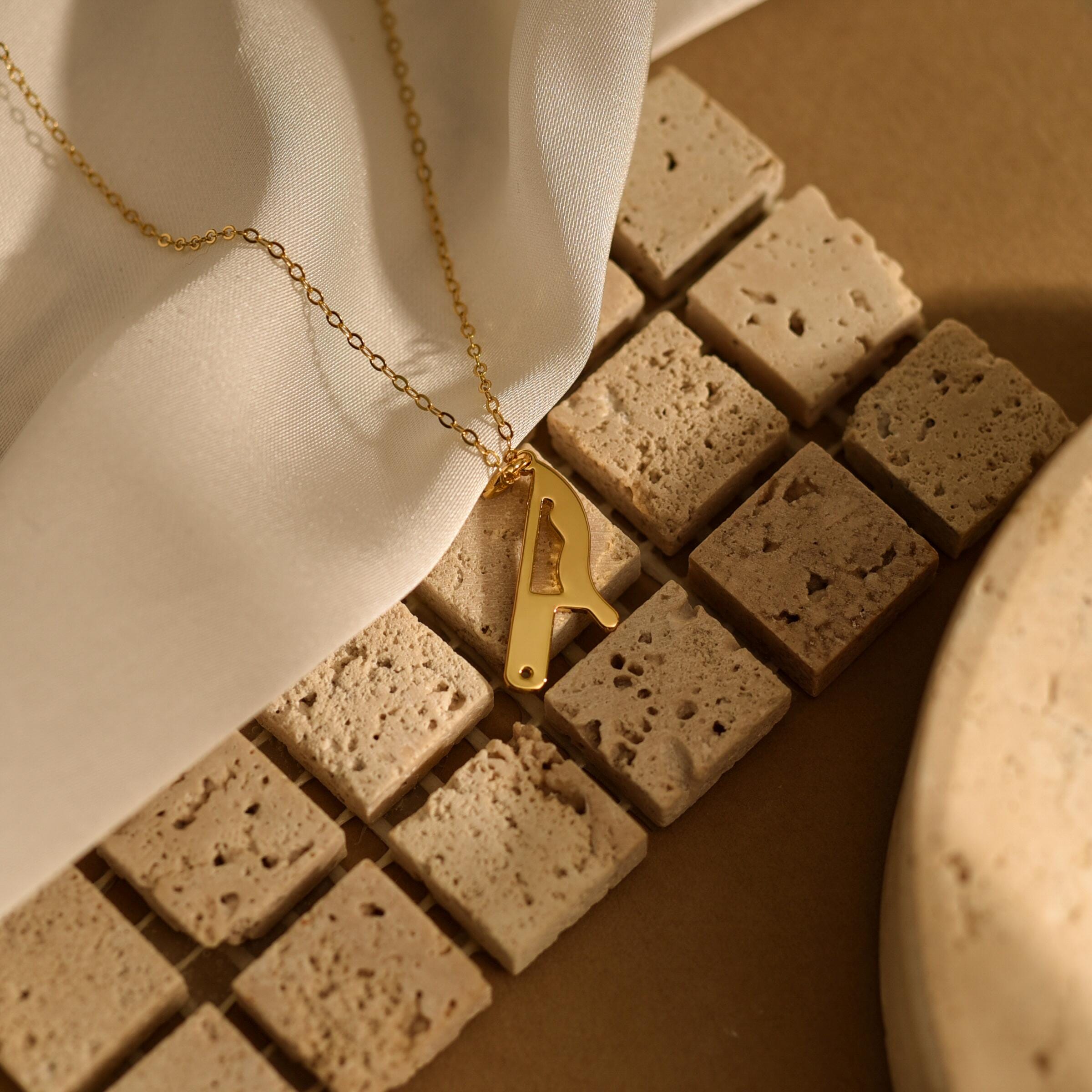 Gold Dripping Knife Pendant Necklace