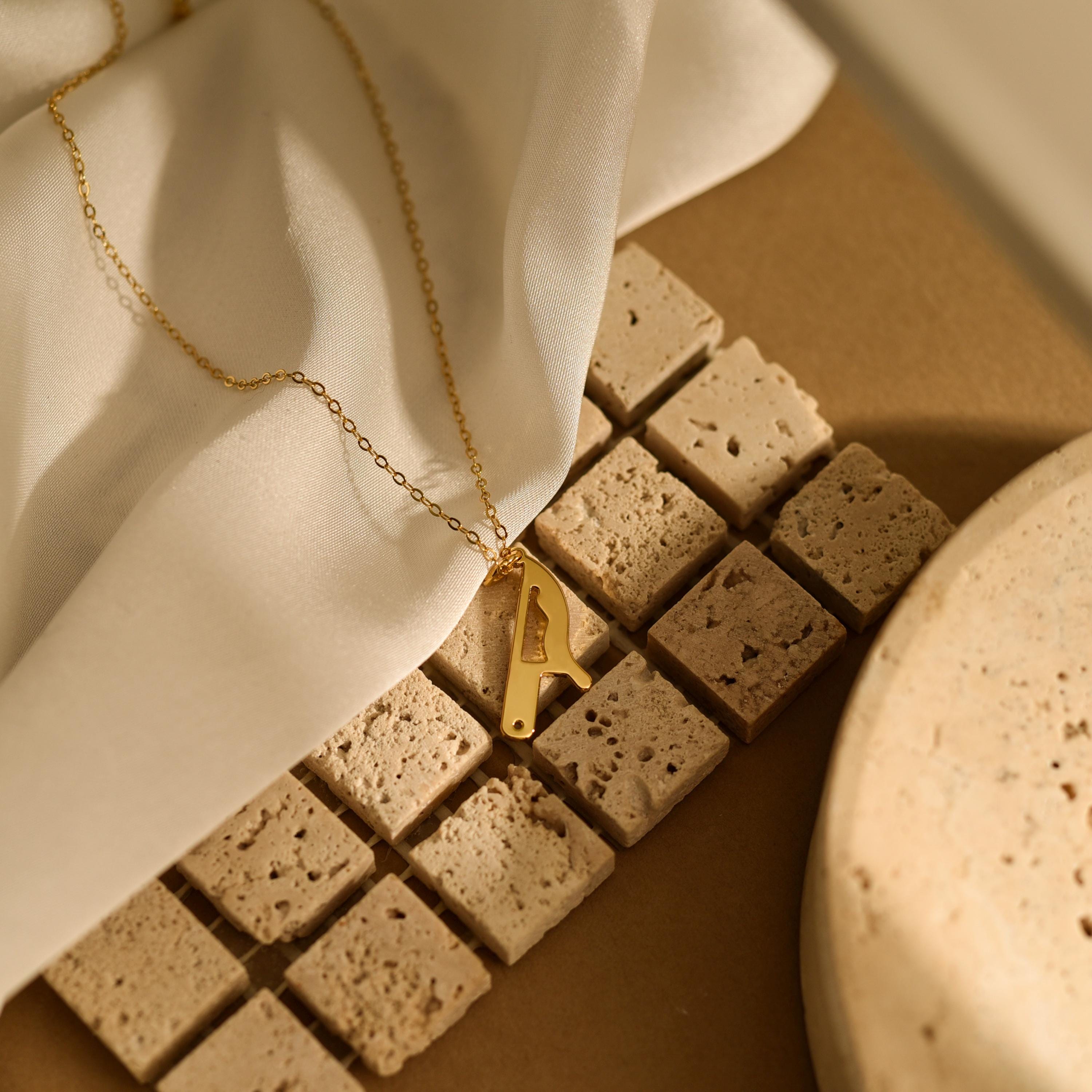 Gold Dripping Knife Pendant Necklace